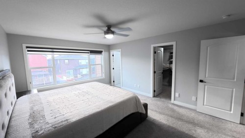 144 Red Embers Square Ne, Calgary, AB - Indoor Photo Showing Bedroom