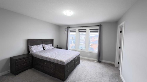 144 Red Embers Square Ne, Calgary, AB - Indoor Photo Showing Bedroom