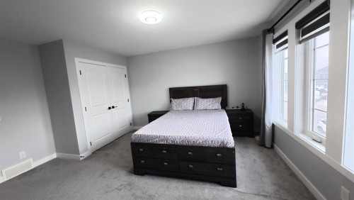 144 Red Embers Square Ne, Calgary, AB - Indoor Photo Showing Bedroom
