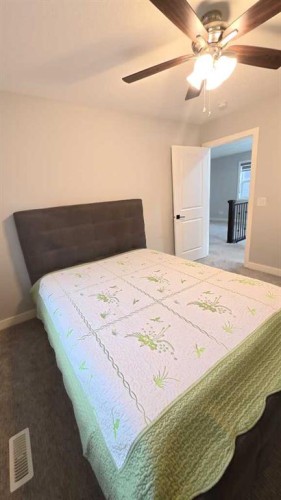 144 Red Embers Square Ne, Calgary, AB - Indoor Photo Showing Bedroom