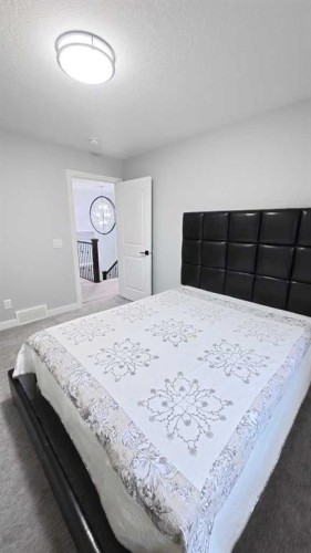 144 Red Embers Square Ne, Calgary, AB - Indoor Photo Showing Bedroom