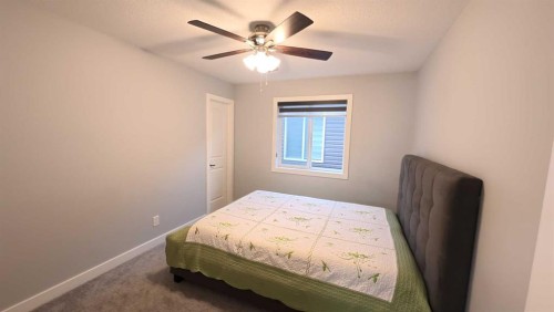 144 Red Embers Square Ne, Calgary, AB - Indoor Photo Showing Bedroom