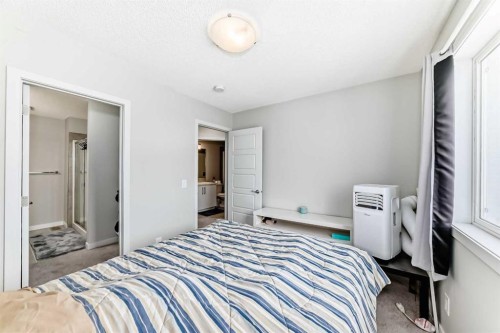806-32 Red Embers Parade Ne, Calgary, AB - Indoor Photo Showing Bedroom