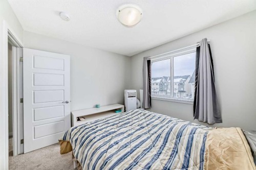 806-32 Red Embers Parade Ne, Calgary, AB - Indoor Photo Showing Bedroom