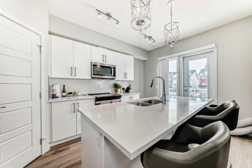 806-32 Red Embers Parade Ne, Calgary, AB - Indoor Photo Showing Kitchen With Double Sink With Upgraded Kitchen