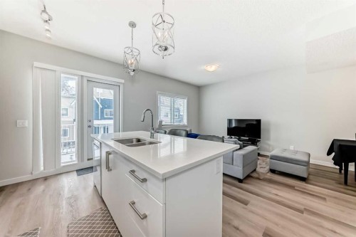 806-32 Red Embers Parade Ne, Calgary, AB - Indoor Photo Showing Kitchen With Double Sink