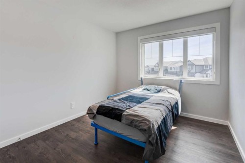 40 Verity Place Sw, Calgary, AB - Indoor Photo Showing Bedroom