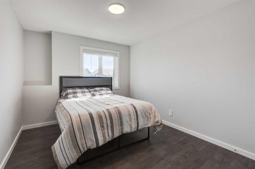 40 Verity Place Sw, Calgary, AB - Indoor Photo Showing Bedroom