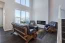 40 Verity Place Sw, Calgary, AB  - Indoor Photo Showing Other Room With Fireplace 