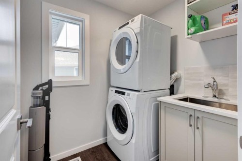 40 Verity Place Sw, Calgary, AB - Indoor Photo Showing Laundry Room