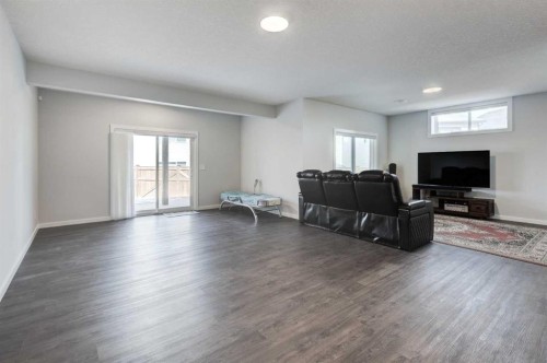 40 Verity Place Sw, Calgary, AB - Indoor Photo Showing Living Room
