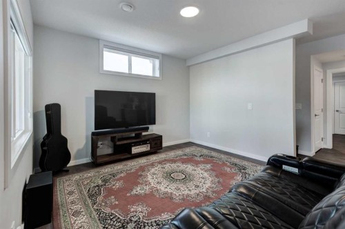 40 Verity Place Sw, Calgary, AB - Indoor Photo Showing Living Room