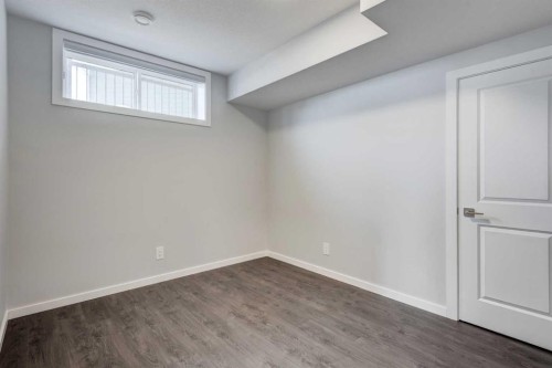 40 Verity Place Sw, Calgary, AB - Indoor Photo Showing Other Room