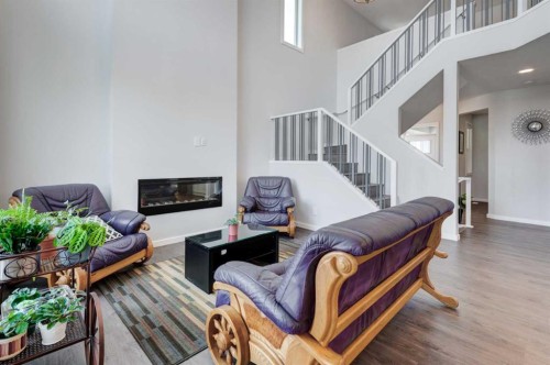 40 Verity Place Sw, Calgary, AB - Indoor With Fireplace