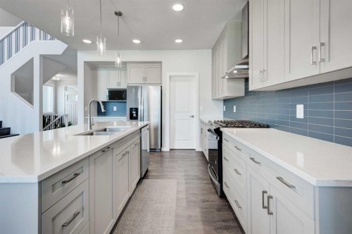 40 Verity Place Sw, Calgary, AB - Indoor Photo Showing Kitchen With Double Sink With Upgraded Kitchen