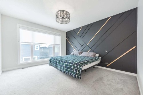 181 Amblehurst Rise Nw, Calgary, AB - Indoor Photo Showing Bedroom
