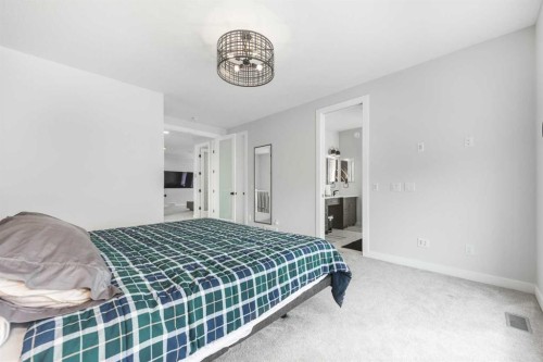 181 Amblehurst Rise Nw, Calgary, AB - Indoor Photo Showing Bedroom