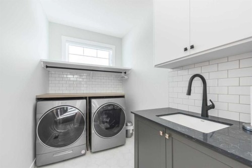 181 Amblehurst Rise Nw, Calgary, AB - Indoor Photo Showing Laundry Room