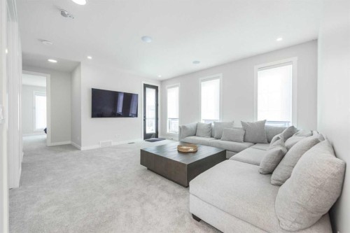 181 Amblehurst Rise Nw, Calgary, AB - Indoor Photo Showing Living Room