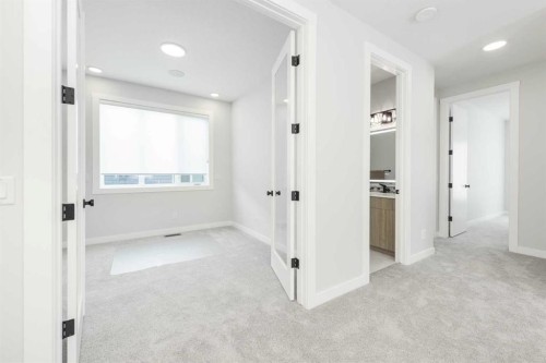 181 Amblehurst Rise Nw, Calgary, AB - Indoor Photo Showing Other Room