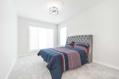 181 Amblehurst Rise Nw, Calgary, AB - Indoor Photo Showing Bedroom