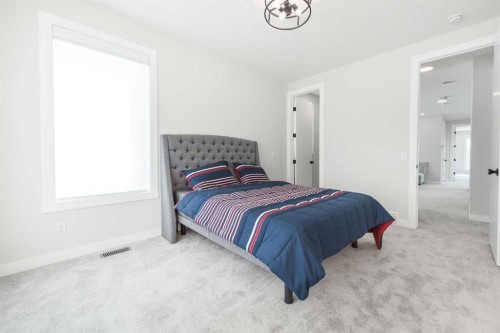 181 Amblehurst Rise Nw, Calgary, AB - Indoor Photo Showing Bedroom