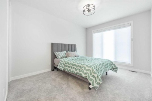 181 Amblehurst Rise Nw, Calgary, AB - Indoor Photo Showing Bedroom