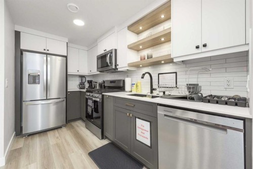 181 Amblehurst Rise Nw, Calgary, AB - Indoor Photo Showing Kitchen With Upgraded Kitchen