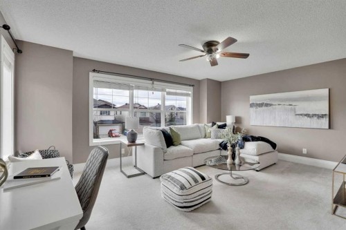 274 Everoak Drive Sw, Calgary, AB - Indoor Photo Showing Living Room