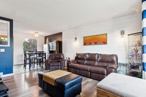147 Falchurch Crescent Ne, Calgary, AB - Indoor Photo Showing Living Room