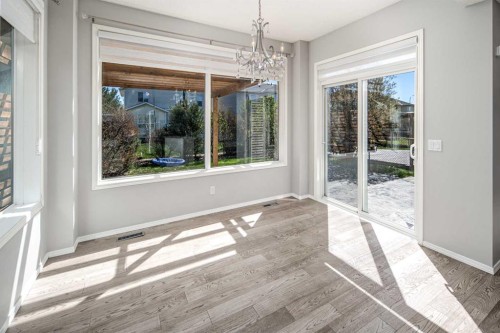 32 Cougarstone Square Sw, Calgary, AB - Indoor Photo Showing Other Room