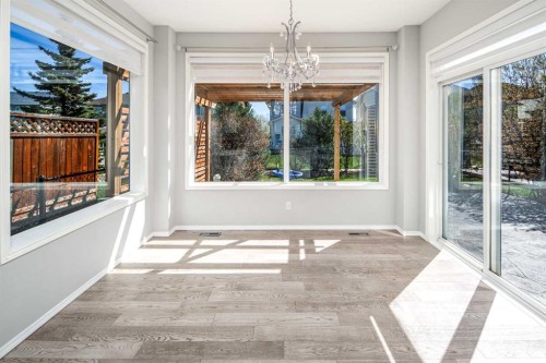 32 Cougarstone Square Sw, Calgary, AB - Indoor Photo Showing Other Room