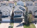32 Cougarstone Square Sw, Calgary, AB  - Outdoor With Facade 