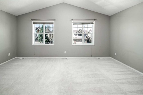32 Cougarstone Square Sw, Calgary, AB - Indoor Photo Showing Other Room