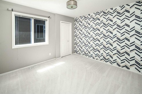 32 Cougarstone Square Sw, Calgary, AB -  Photo Showing Other Room