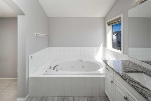 32 Cougarstone Square Sw, Calgary, AB - Indoor Photo Showing Bathroom