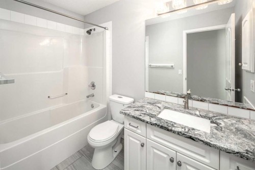 32 Cougarstone Square Sw, Calgary, AB - Indoor Photo Showing Bathroom
