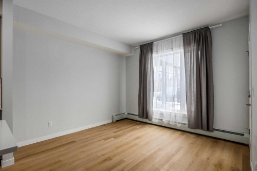101-200 Shawnee Square Sw, Calgary, AB - Indoor Photo Showing Other Room