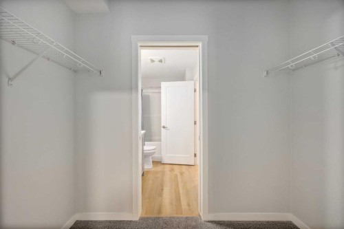 101-200 Shawnee Square Sw, Calgary, AB - Indoor With Storage