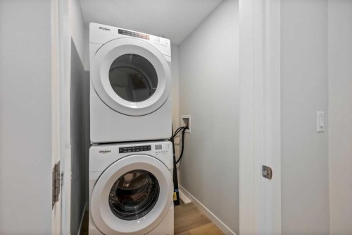 101-200 Shawnee Square Sw, Calgary, AB - Indoor Photo Showing Laundry Room