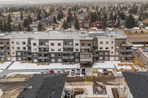 101-200 Shawnee Square Sw, Calgary, AB - Outdoor With Balcony