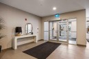 101-200 Shawnee Square Sw, Calgary, AB  - Indoor Photo Showing Other Room 