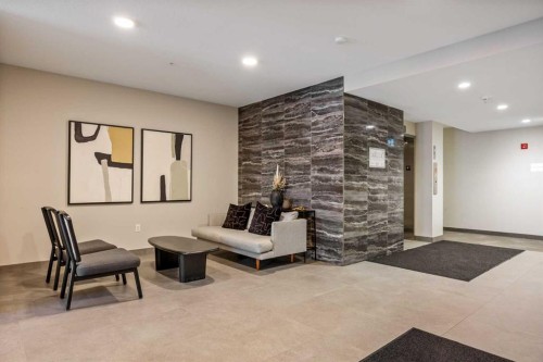 101-200 Shawnee Square Sw, Calgary, AB - Indoor Photo Showing Other Room