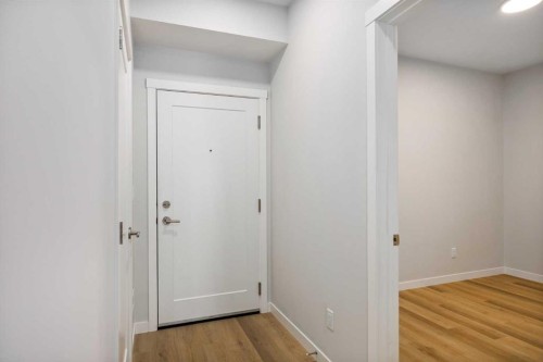 101-200 Shawnee Square Sw, Calgary, AB - Indoor Photo Showing Other Room