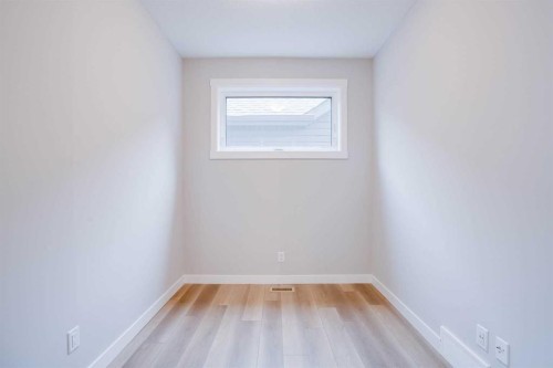 77 Calhoun Crescent Ne, Calgary, AB - Indoor Photo Showing Other Room