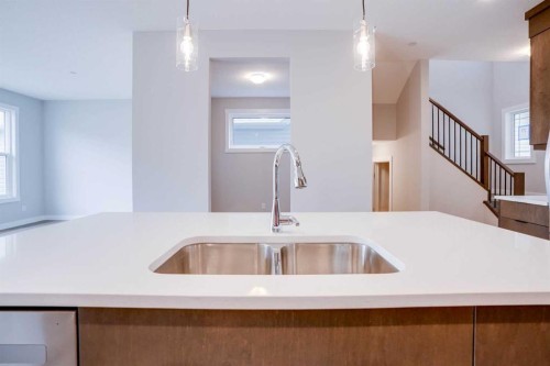 77 Calhoun Crescent Ne, Calgary, AB - Indoor Photo Showing Kitchen With Double Sink