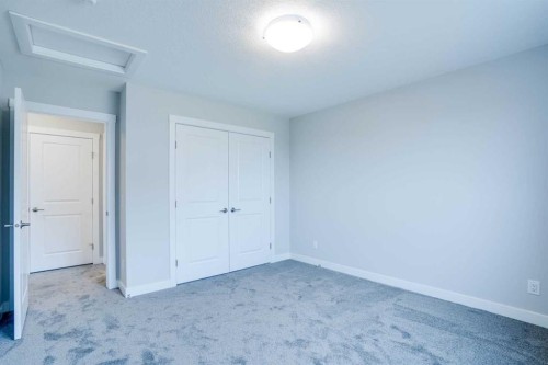 77 Calhoun Crescent Ne, Calgary, AB - Indoor Photo Showing Other Room