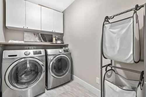 112 Kinniburgh Close, Chestermere, AB - Indoor Photo Showing Laundry Room