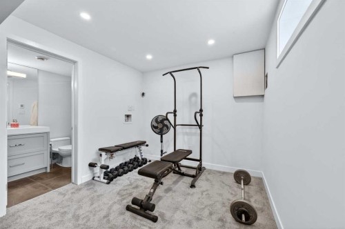 1423 18 Street Ne, Calgary, AB - Indoor Photo Showing Gym Room