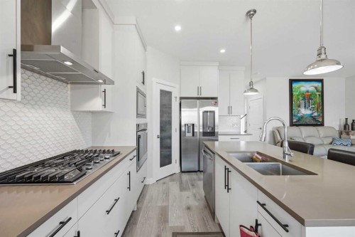 82 Legacy Glen Terrace Se, Calgary, AB - Indoor Photo Showing Kitchen With Double Sink With Upgraded Kitchen